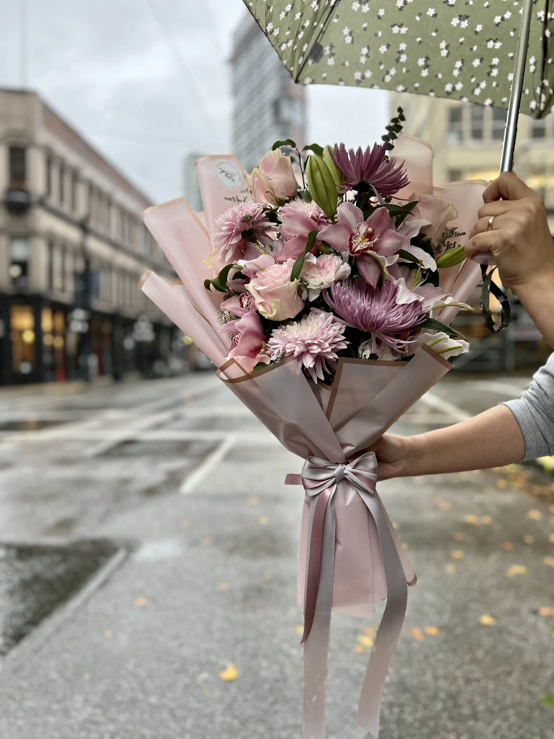 Blushing Bloom Bouquet with pink roses, lilies, and orchids