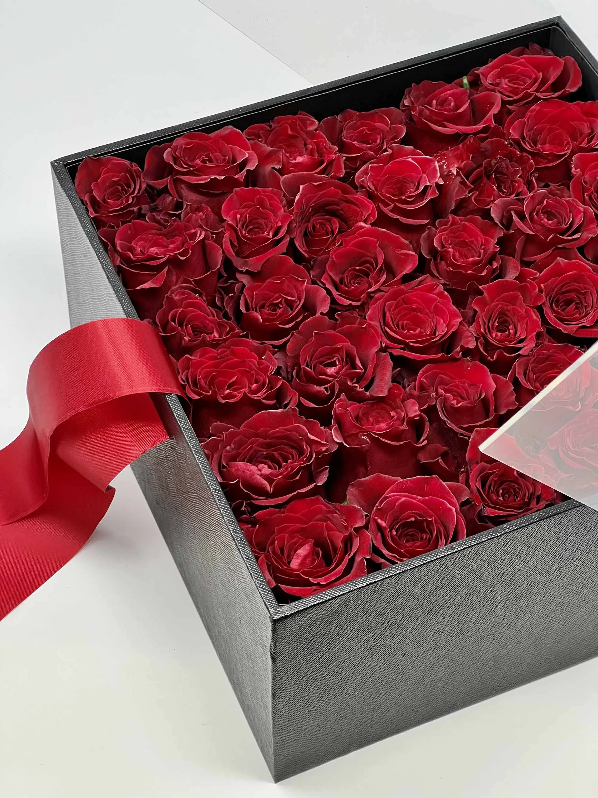Top-down view of the Luxurious Eternity Rose Box with 36 red roses.