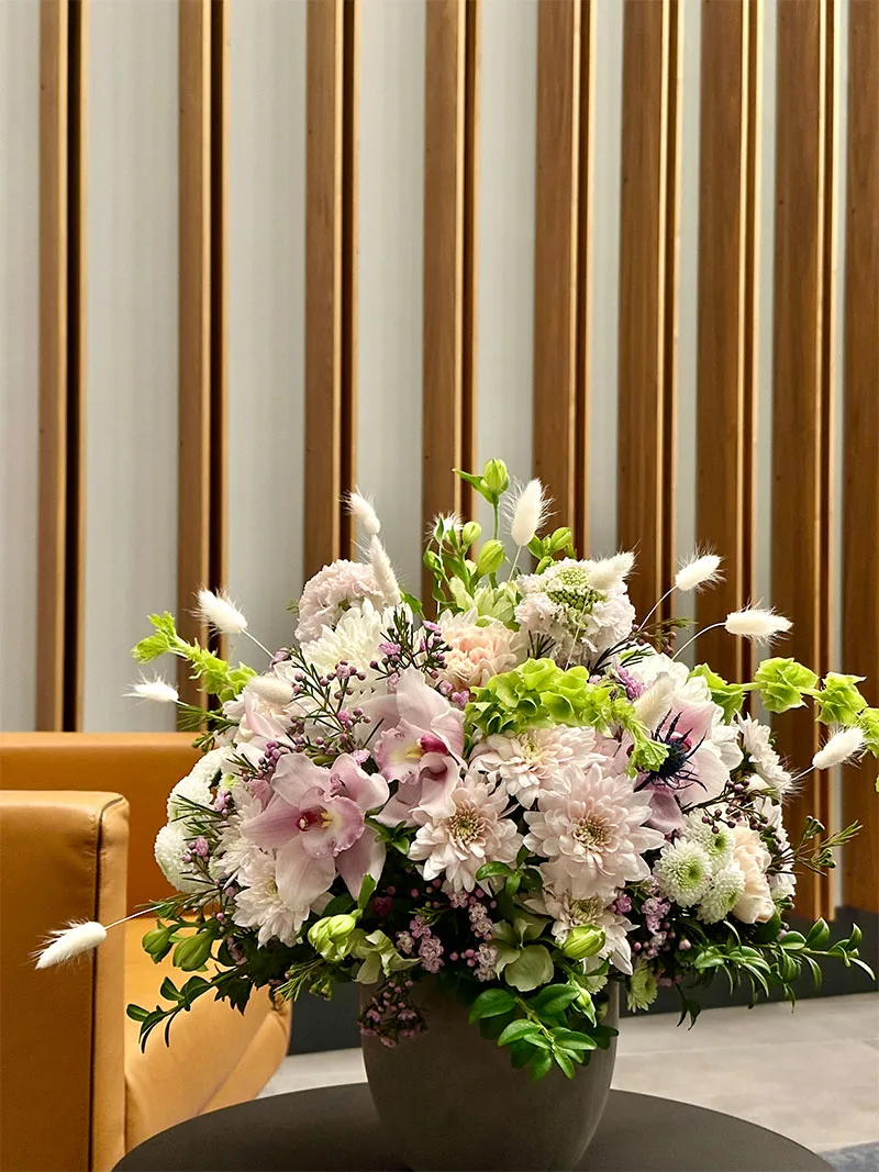 Close-up of Floral Pot Arrangement with pastel flowers in cement pot – Vancouver florist