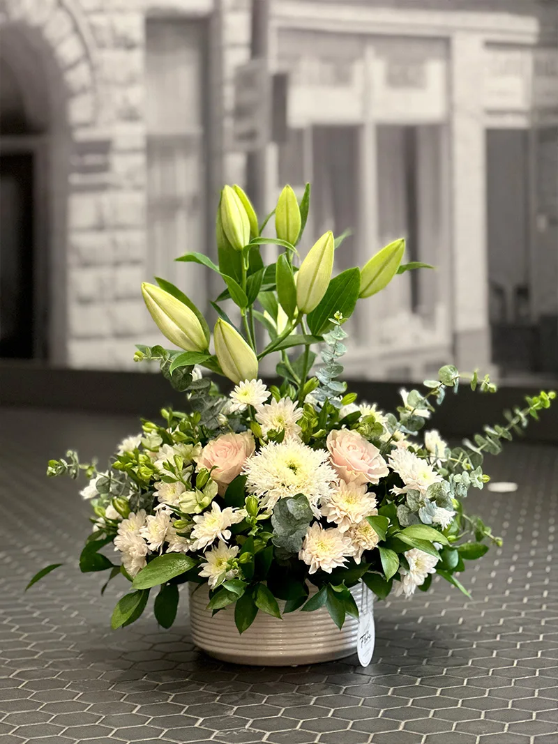 White floral arrangement Vancouver with lilies and roses