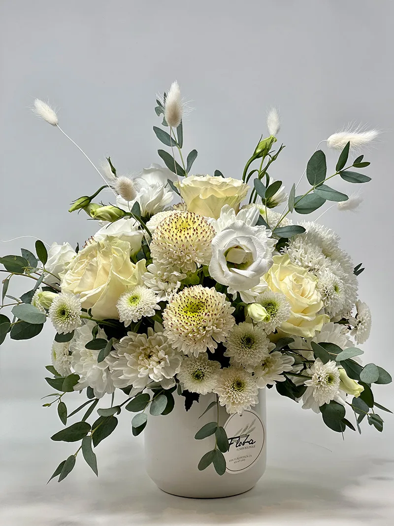 graceful funeral flower arrangement vancouver in white ceramic pot