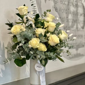 Timeless Rose Vase Arrangement – white roses and eucalyptus in ceramic vase by Floba Vancouver