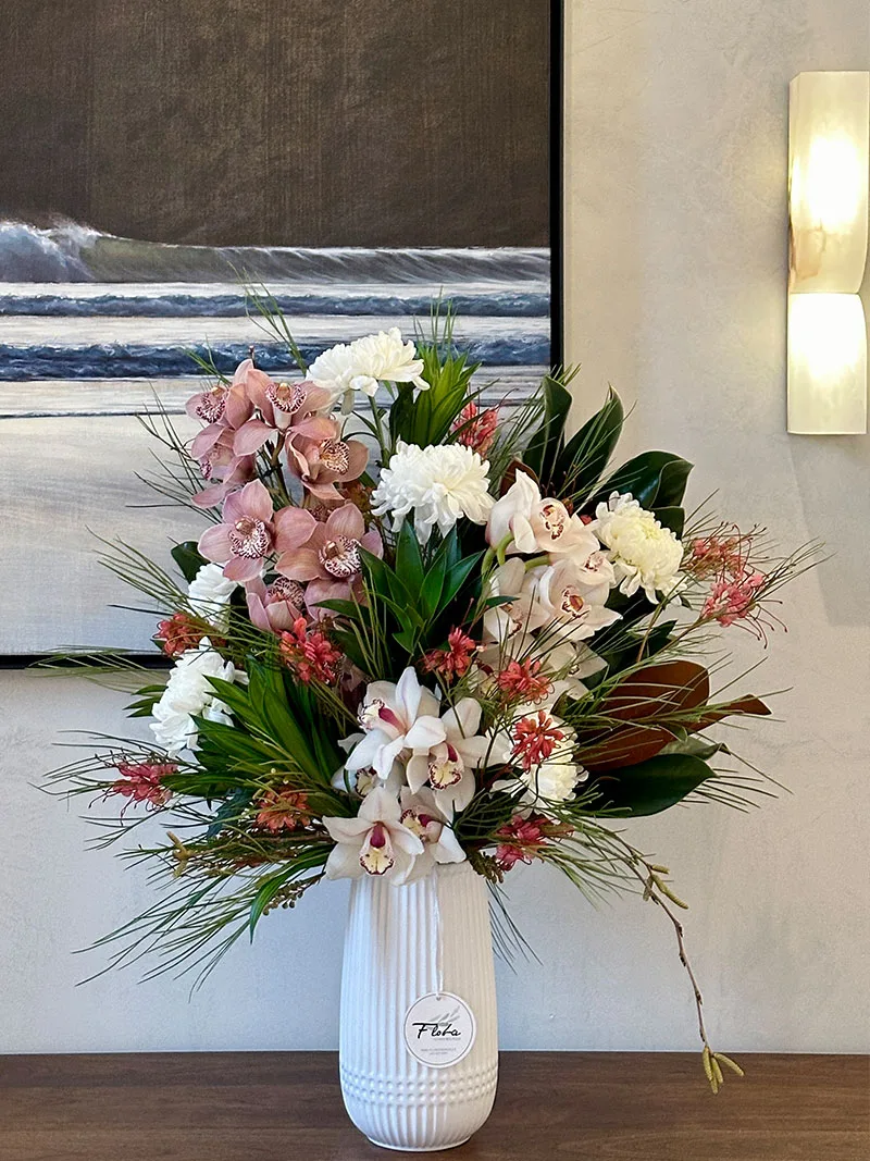 Close-up detail of Orchid Grace Vase Arrangement pink and white flowers