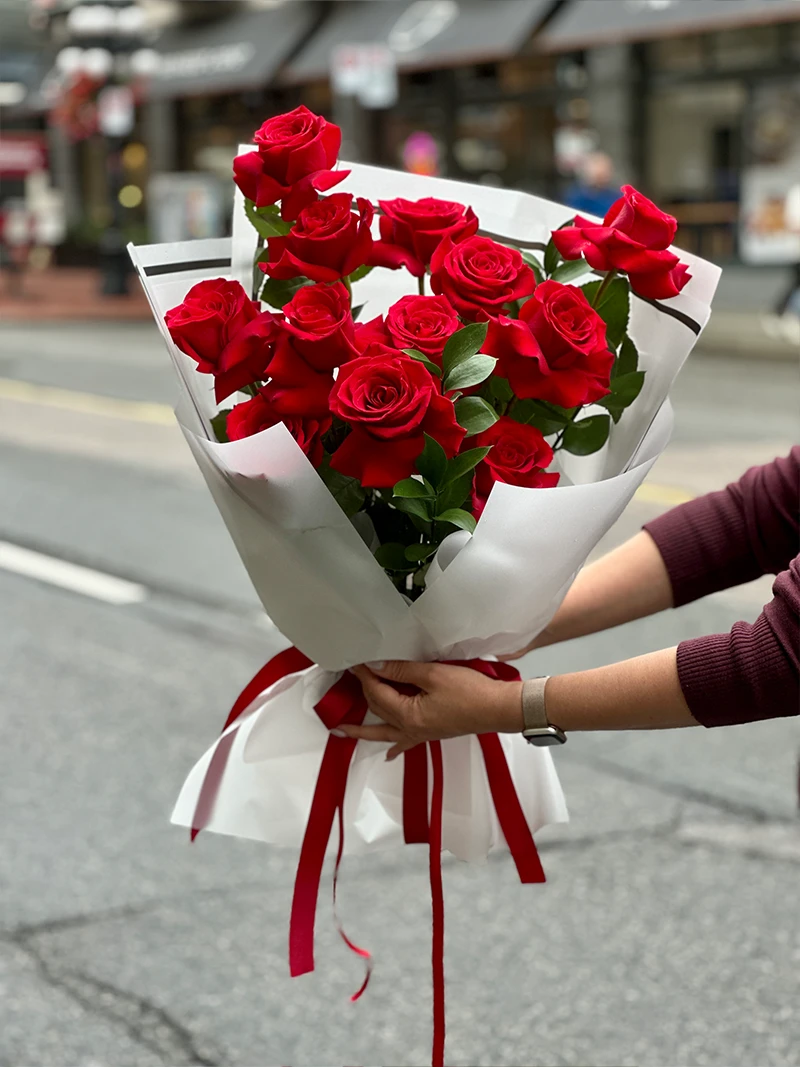 Vancouver Flower Shop Luxury Freedom Roses wrapped in white with red ribbon