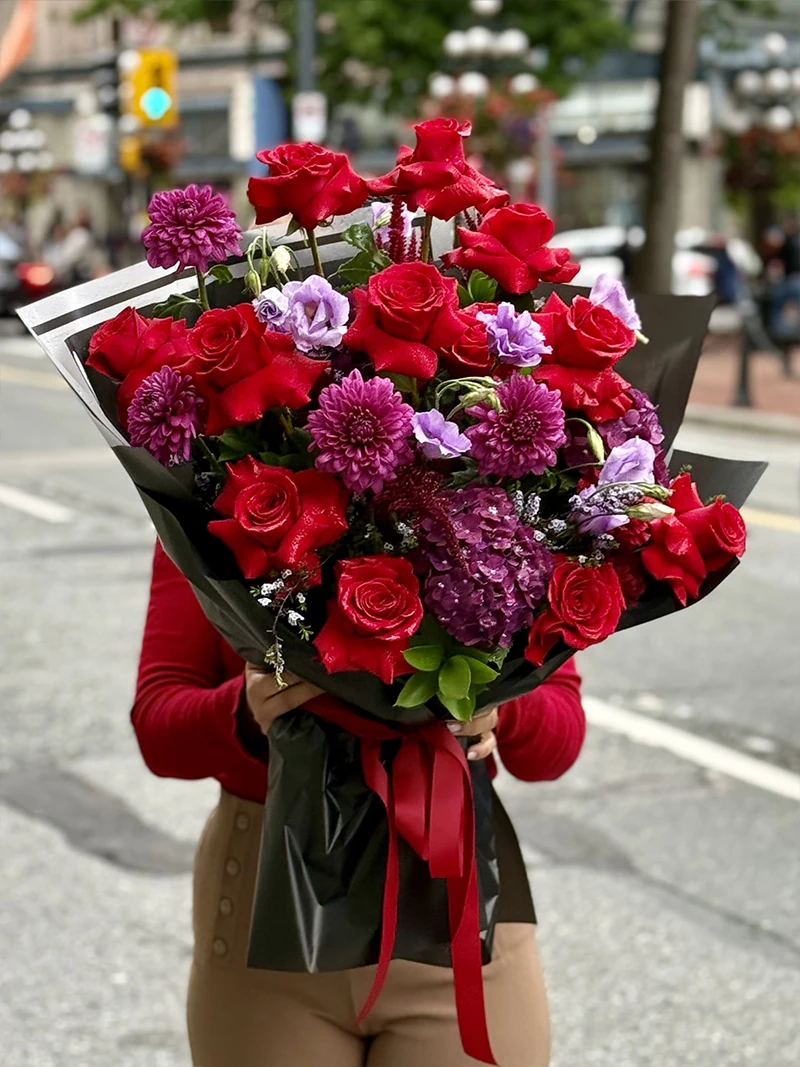 Romantic red rose and purple bouquet