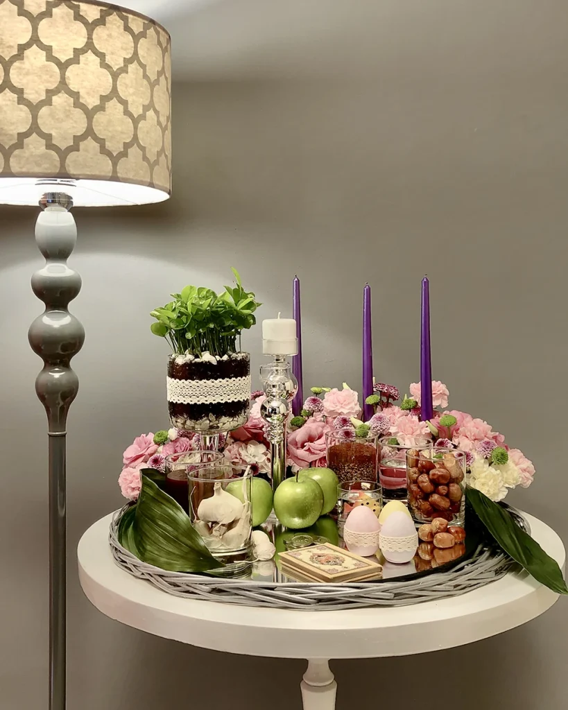 Haft-Seen table design with flowers and candles in Vancouver by Floba Flower Boutique